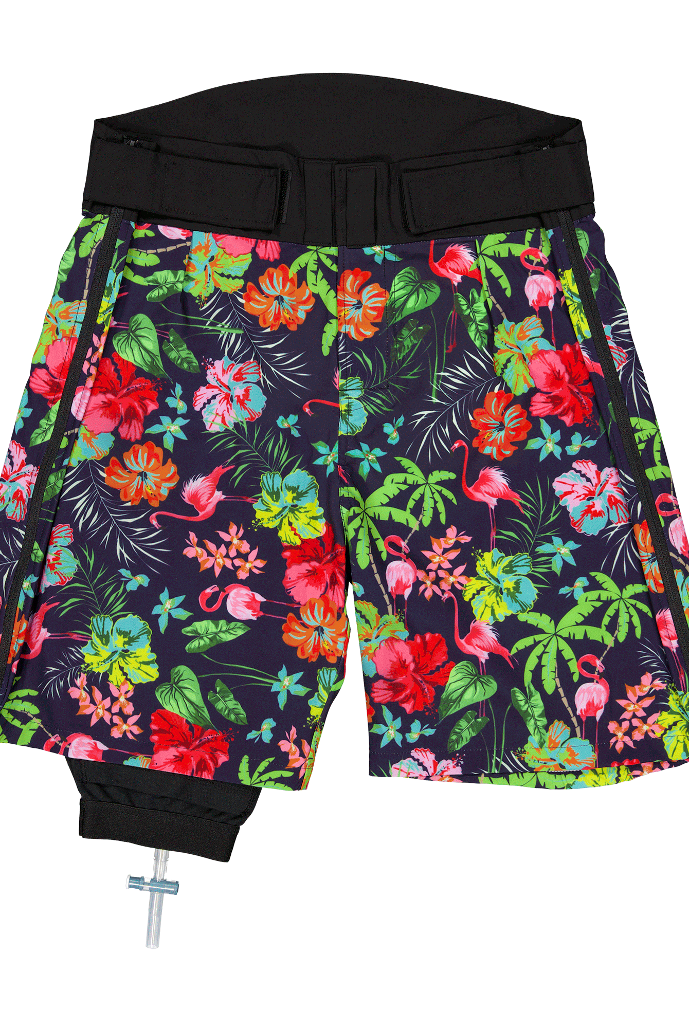 Catheter Bag Leg Cover featuring vibrant tropical floral print shorts with black waistband, designed to discreetly conceal medical equipment while maintaining style and comfort. Navy background with colorful hibiscus flowers, palm leaves, and tropical motifs in red, green, and turquoise.