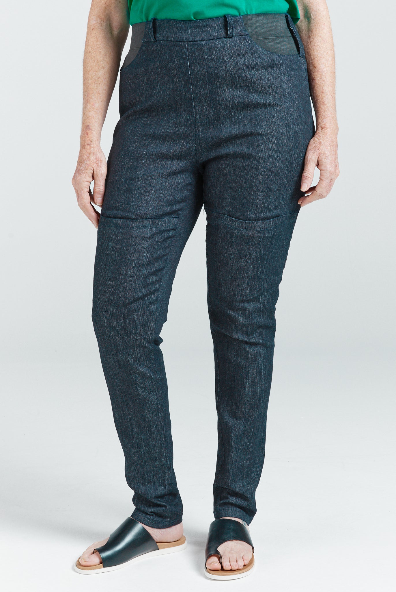 Women's Seated Stretch Pant Indigo dark blue soft elastic waist trousers with front thigh pockets and pull tab loops.