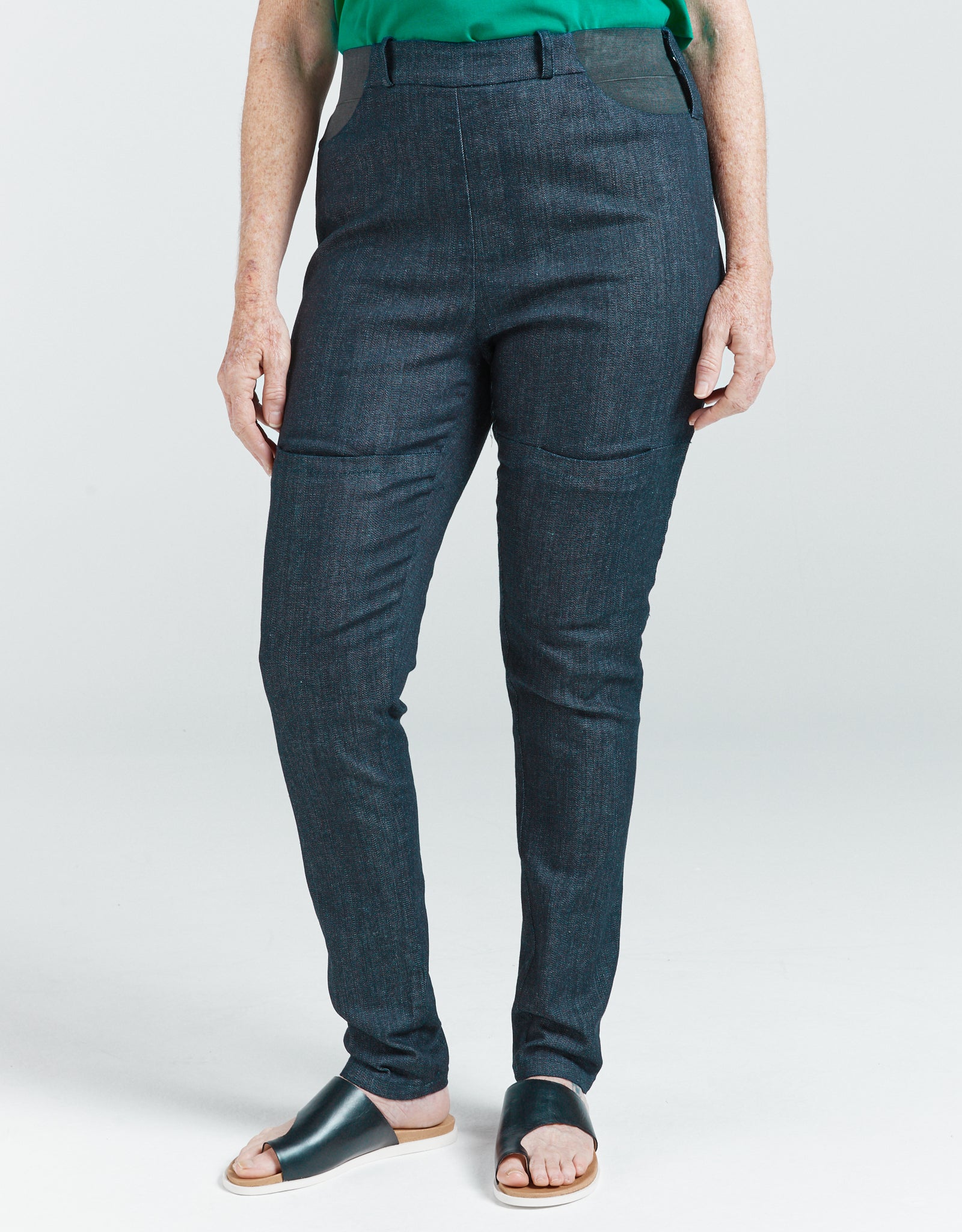 Women's Seated Stretch Pant Indigo dark blue soft elastic waist trousers with front thigh pockets and pull tab loops.
