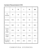 Size chart for Short Sleeve Prism Back T-Shirt displaying measurements in centimeters across S to 2XL sizes, including shoulder width, chest, hem, front length, sleeve length, and sleeve opening dimensions, with Christina Stephens branding