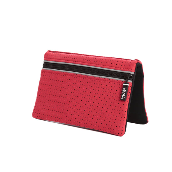 The VIVRA 'Base' waist bag in red, perforated wallet with black trim and zipper, adorned with a visible brand tag that says, 'Vivra', displayed against a white background.