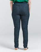 Women's Seated Stretch Pant - Indigo shown from the back, featuring elastic waist and dark blue stretch fabric.